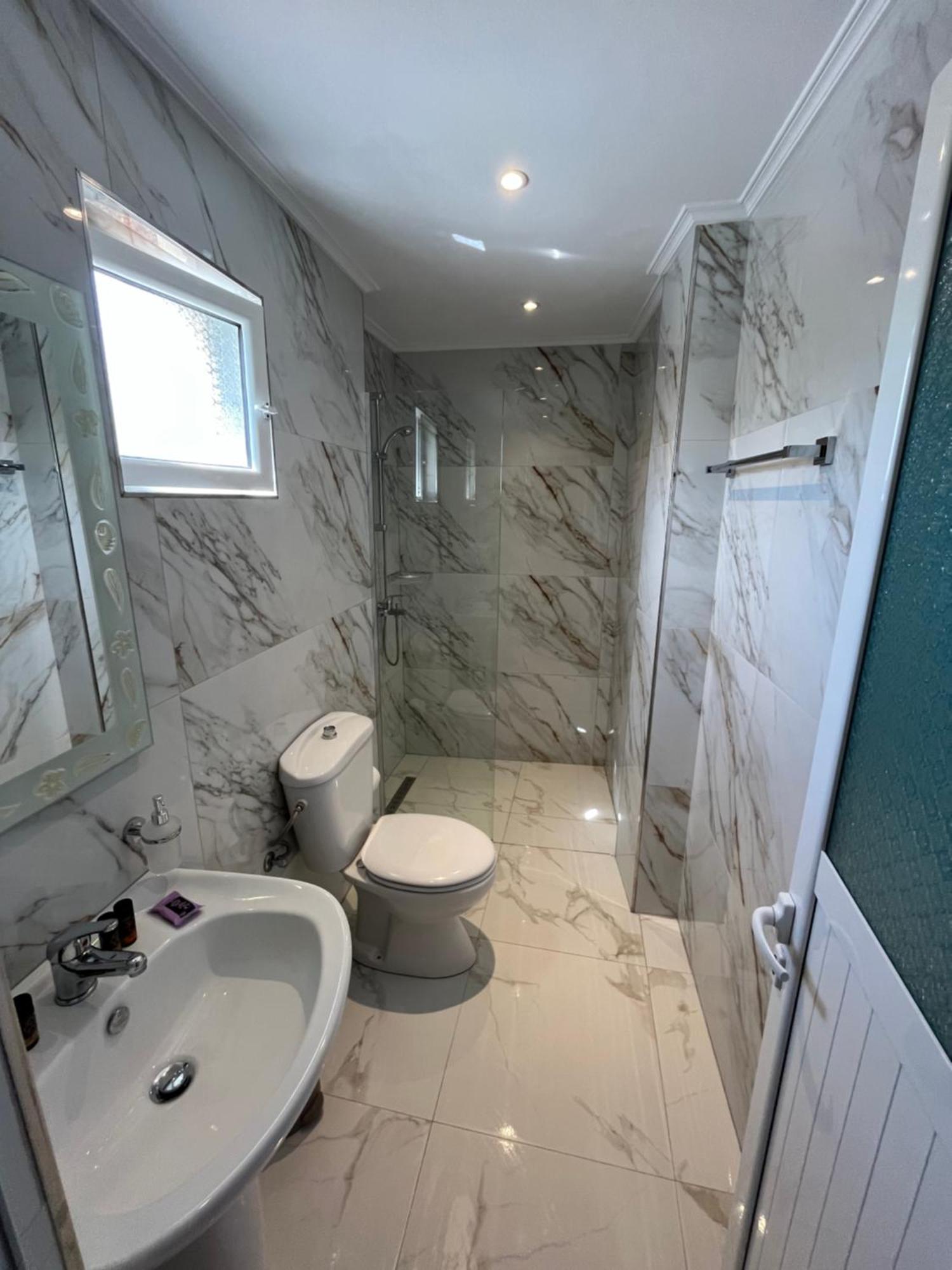 Levend Apartments Ксамил Экстерьер фото